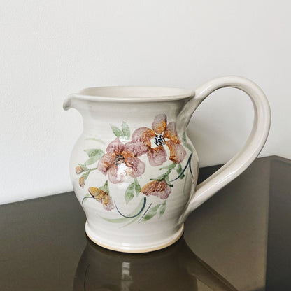 Floral artisan pottery pitcher